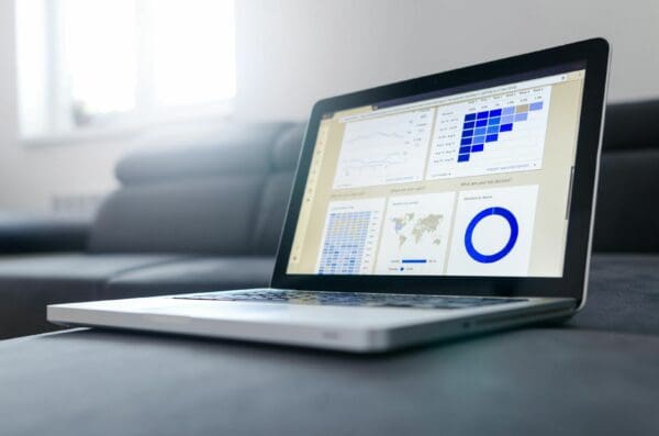 Laptop with Analytics Dashboard Screen
